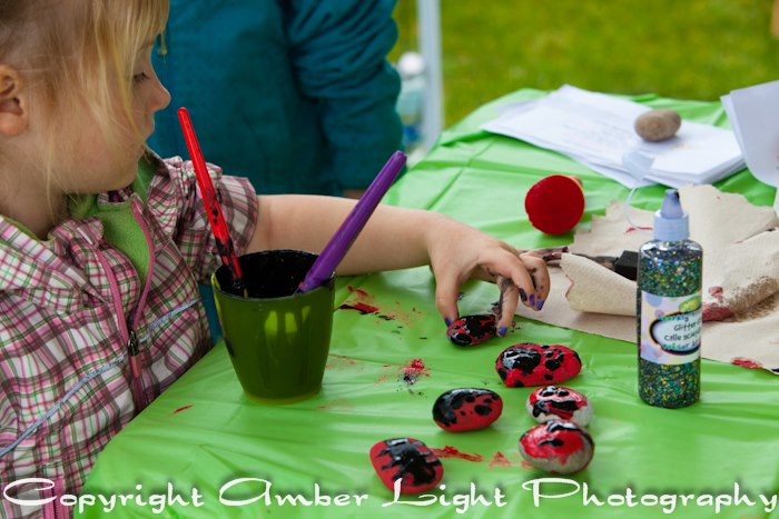 Ladybug Rock Craft at Earth Day by Amber Light Photography - April 20, 2013