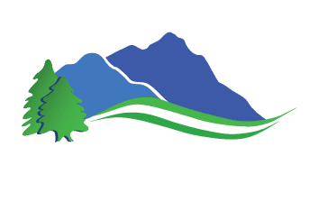 Recycling community logo with mountains and trees.